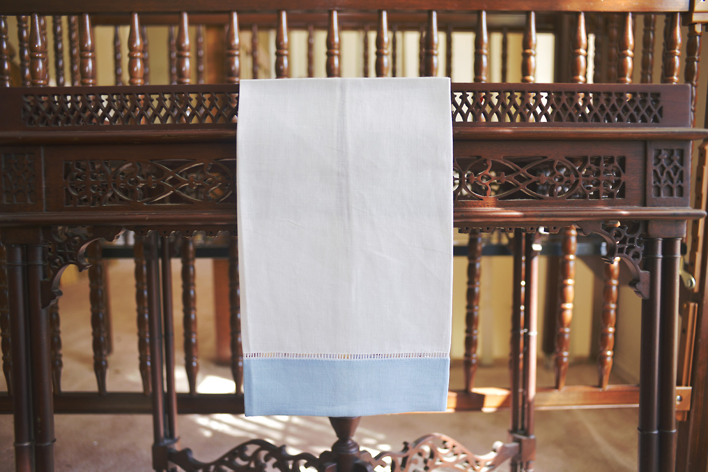 hemstitch guest towel with blue bell border